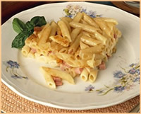 Penne al forno con Bel Paese e prosciutto