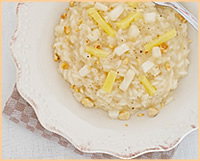 Risotto alle pere con Fontal e nocciole tostate